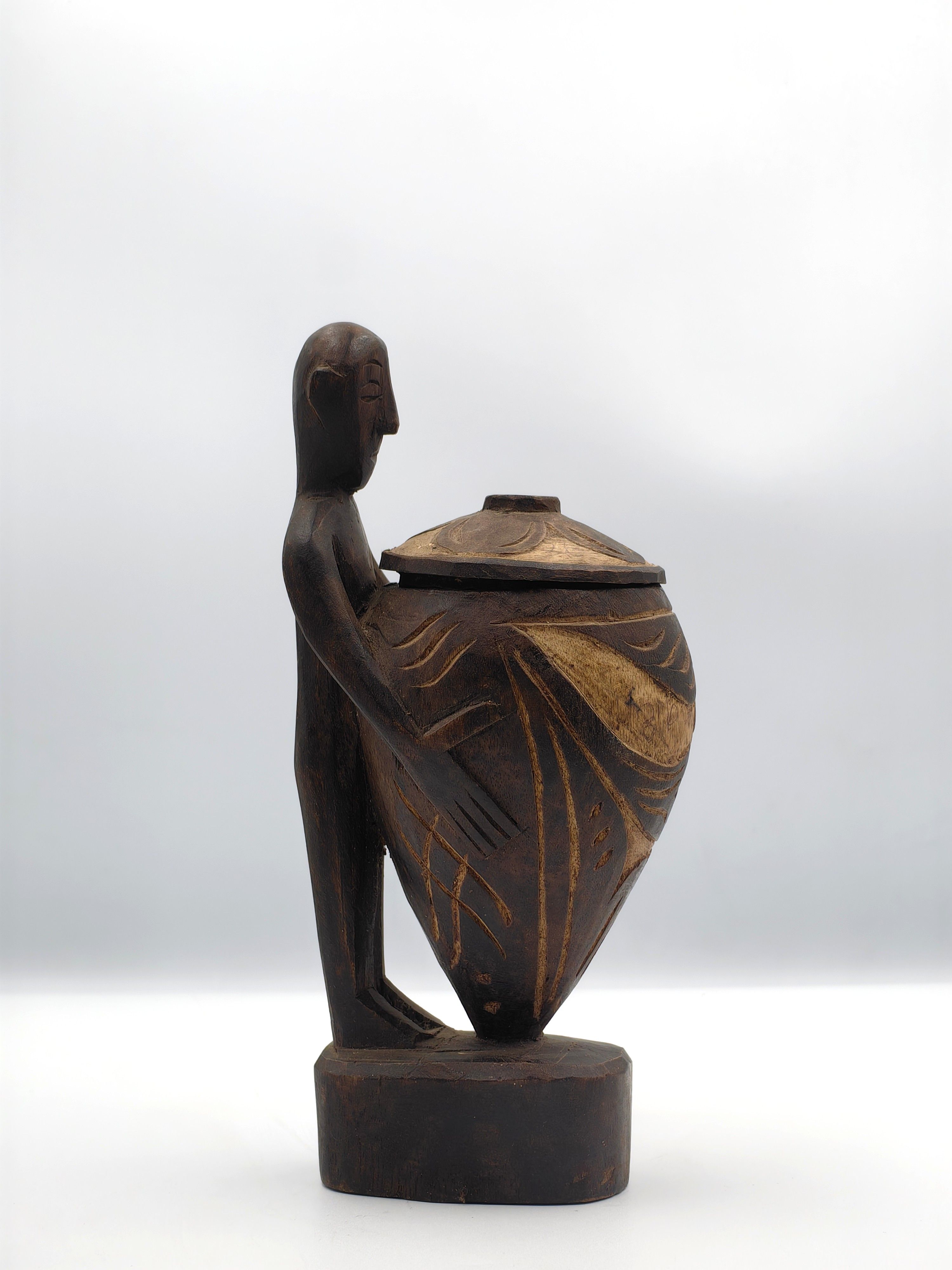 20th Century Palawan Wood Carving of a Couple Holding Large Jars - Additional view