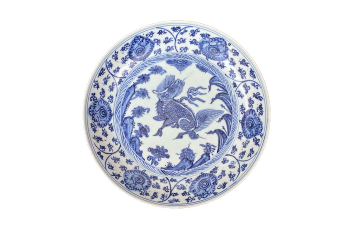 A Large Ming Style Blue and White Dish with Quilin and Floral Designs
